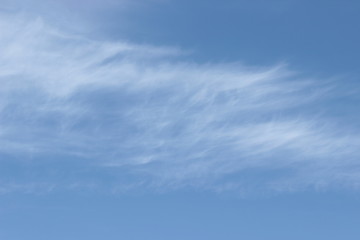 Beautiful feathery clouds in the blue sky