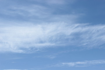 Beautiful feathery clouds in the blue sky