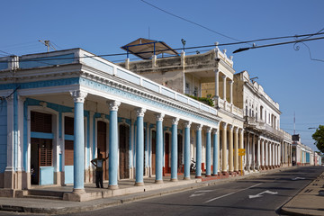 Cienfuegos, Cuba - July 26, 2018: Traditional colonial style colored buildings located on main street Paseo el Prado in Cienfuegos, Cuba