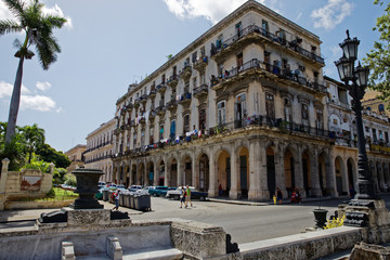 Havana, Cuba - July 30, 2018:  Street scene with traditional colorful buildings in downtown Havana