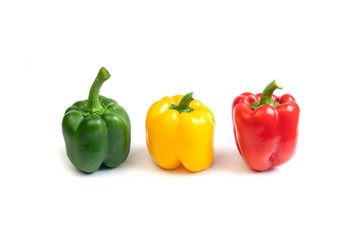 Fresh three color sweet peppers isolated on white background