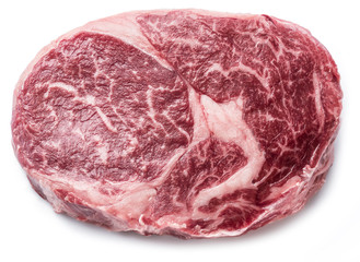 Obraz premium Raw Ribeye steak or beef steak isolated on white background.