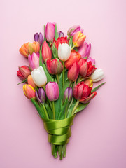 Colorful bouquet of tulips on white background.