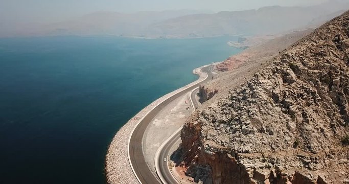 Coastal road and seaside in Musandam Governorate of Oman aerial footage