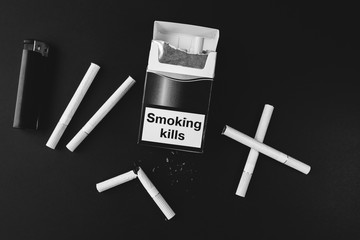 Smoking kills sign on the pack of cigarettes. Dangerous habit. Harmful for health.
