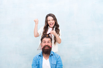 Change hairstyle. Create funny hairstyle. Child making hairstyle styling father beard. Being parent...