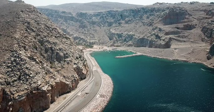 Coastal road and seaside in Musandam Governorate of Oman aerial footage