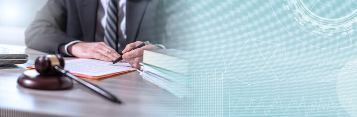 Lawyer reading legal document; panoramic banner