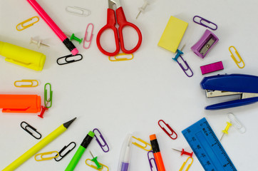 collage of different bright color stationery with clips