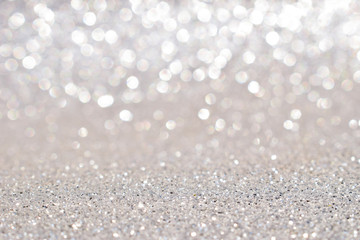 shine and sparkle of silver glitter abstract background	