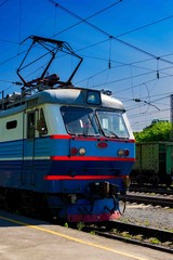 Fototapeta na wymiar Summer.Locomotive goes on rails. Russian train. Russian railway.
