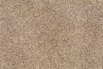 Abstract light brown cement wall textured background, seamless tiling texture