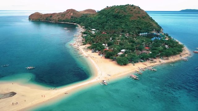 Overview drone shot of Mararison Island in Antique, Philippines with beautiful beach and sandbar in 4k