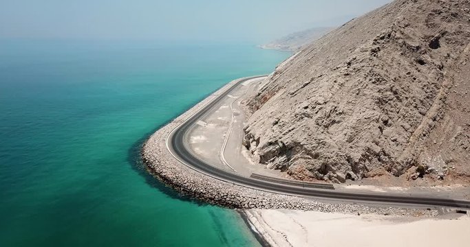 Coastal road and seaside in Musandam Governorate of Oman aerial footage