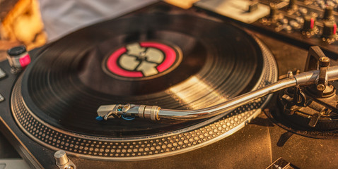 Vinyl record and turntable closeup