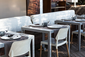 tables and chairs in a cafe