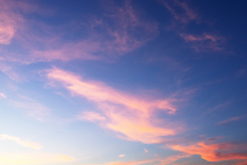 Sunset. Blue sky and pink clouds. Abstract background.