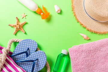 Summer vacation background with copy space. Flat lay photo on color table, travel concept. Free space for text, mock-up