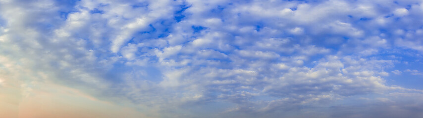 Obraz premium Panorama blue sky with tiny clouds