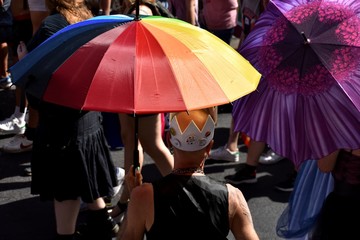 Revelers take part in the Pride Parade in Marseille