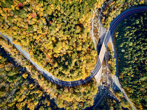 Scenic Mohawk Trail winding highway at autumn, Massachusetts, USA. Fall in New England. Aerial drone shot.
