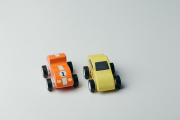 Red and yellow vintage toy cars macro still