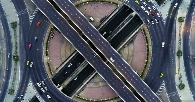aerial top view traffic on circle road in city at day,  Rotational view, Traffic in Bangkok thailand.