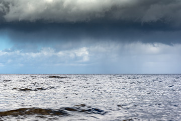 Dark sky over gulf of Riga, Baltic sea.