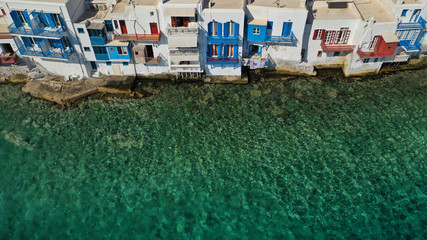 Fototapeta na wymiar Aerial drone photo of iconic colourful white washed and picturesque little Venice in main town of island of Mykonos, Cyclades, Greece