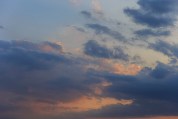 Naklejka na ściany i meble Storm clouds at sunset