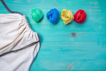 Cotton bag versus plastic bags. Sustainable lifestyle concept. Zero waste.