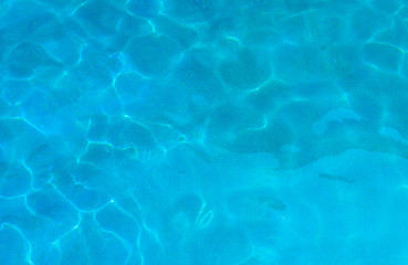 Blue ripped water in swimming pool