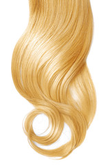 Naklejka premium Blond wavy hair isolated on white background