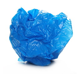Crumpled blue nylon bag for recycling, isolated on white background