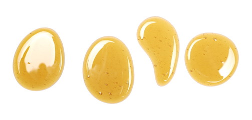 Honey isolated on white background, top view
