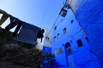 Blue street walls of the popular city of Morocco, Chefchaouen. Traditional moroccan architectural...