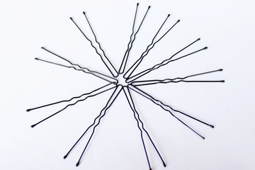 Obraz premium Women's hairpins on a white background