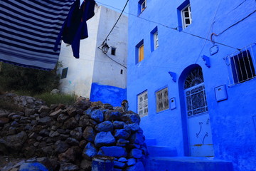 Blue street walls of the popular city of Morocco, Chefchaouen. Traditional moroccan architectural details. - 277333166