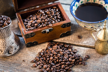 turkish coffee pot on wooden table. aroma drink beverage