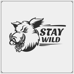 Vector emblem with wild boar for sport club. Print design for t-shirt.