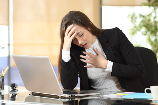 Worried Businesswoman Suffering An Anxiety Attack