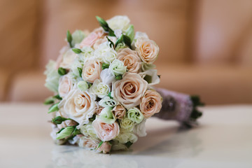 Wedding bouquet in peach color. Beige