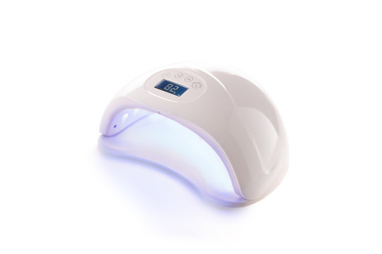 Ultraviolet led manicure white working lamp for drying nails. Isolated on white background