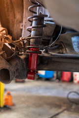 New Red Car Absorber In Auto-Repair Service.