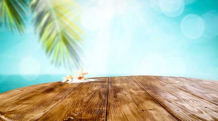 Table background of free space for your decoration and summer beach 