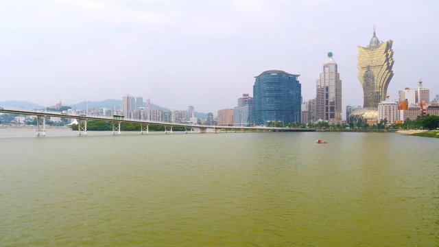 Macau city time-lapse, modern skyscrapers standing over landscape