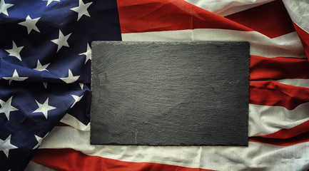 American flag on a black background. Space for text.