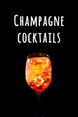 Stylish alcoholic aperol spritz trendy cocktail with orange slice on black background. Vertical photo.. Champagne cocktails wording