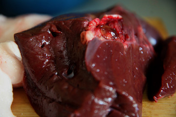 Raw liver on a cutting board