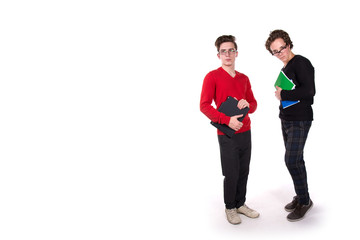 Two young attractive students. White background.